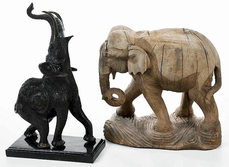 Appraisal: Two Figural Elephants Bronze Carved th st century bronze example