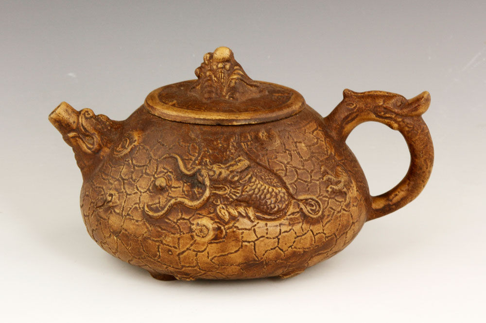 Appraisal: - Chinese Yixing Teapot Chinese Yixing teapot with dragon design