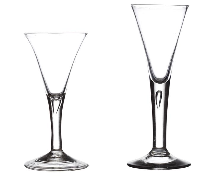 Appraisal: TWO TH CENTURY DRAWN TRUMPET WINE GLASSES both with tear