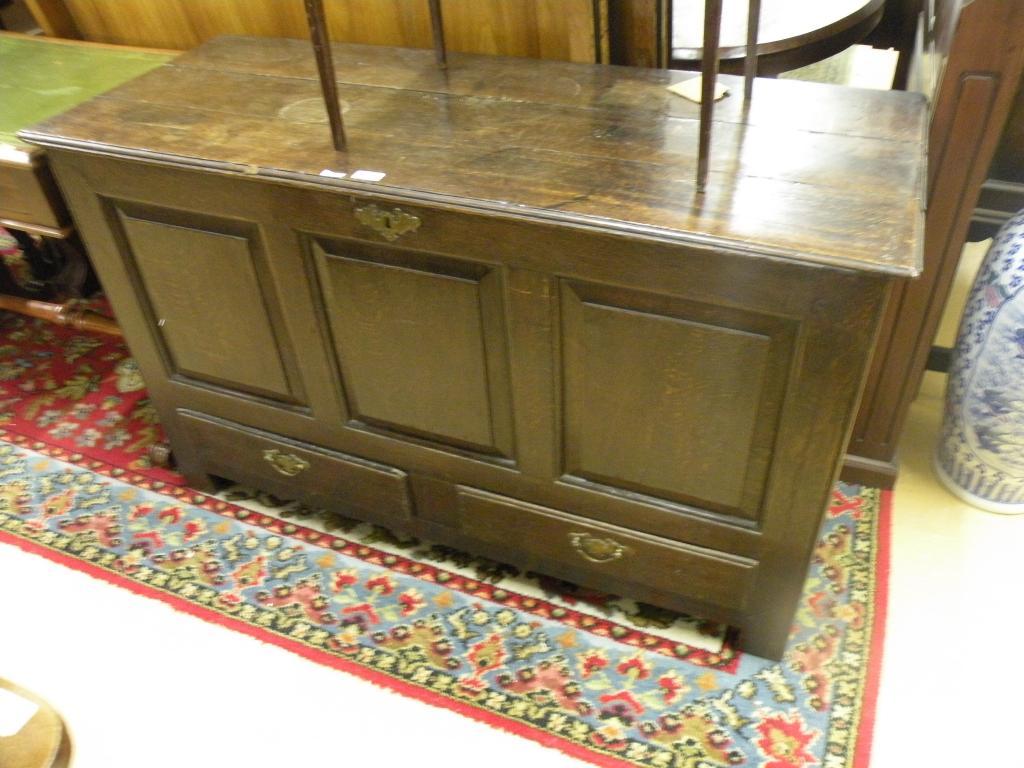 Appraisal: An XVIII century oak mule chest plain plank top three