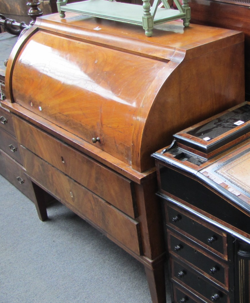 Appraisal: A th century continental mahogany roll top bureau the fitted