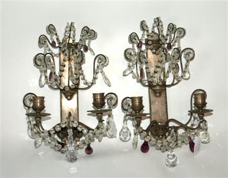 Appraisal: PAIR OF SILVERED BRONZE AND CUT GLASS WALL LIGHTS with