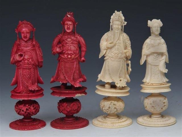 Appraisal: A CARVED IVORY CHESS SET of figures standing on plinths