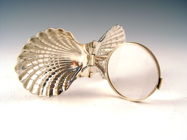 Appraisal: TIFFANY CO STERLING CLAM SHELL FORM MAGNIFIER Travel magnifying glass