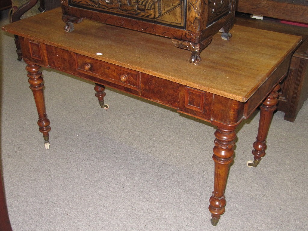 Appraisal: Victorian walnut single drawer writing table raised on spindle supports