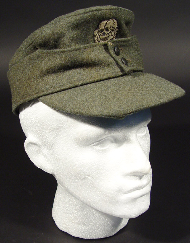 Appraisal: World War II German military green cloth cap with skull