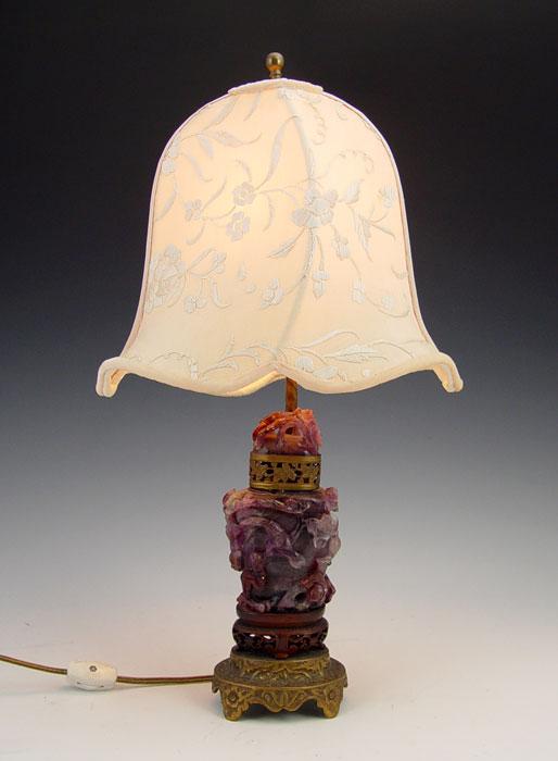 Appraisal: CHINESE CARVED PURPLE QUARTZ LAMP Covered jar mounted as a