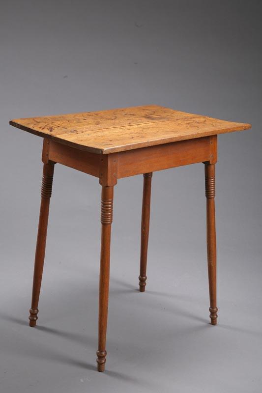 Appraisal: STAND American early th century walnut Two-board top overhanging straight