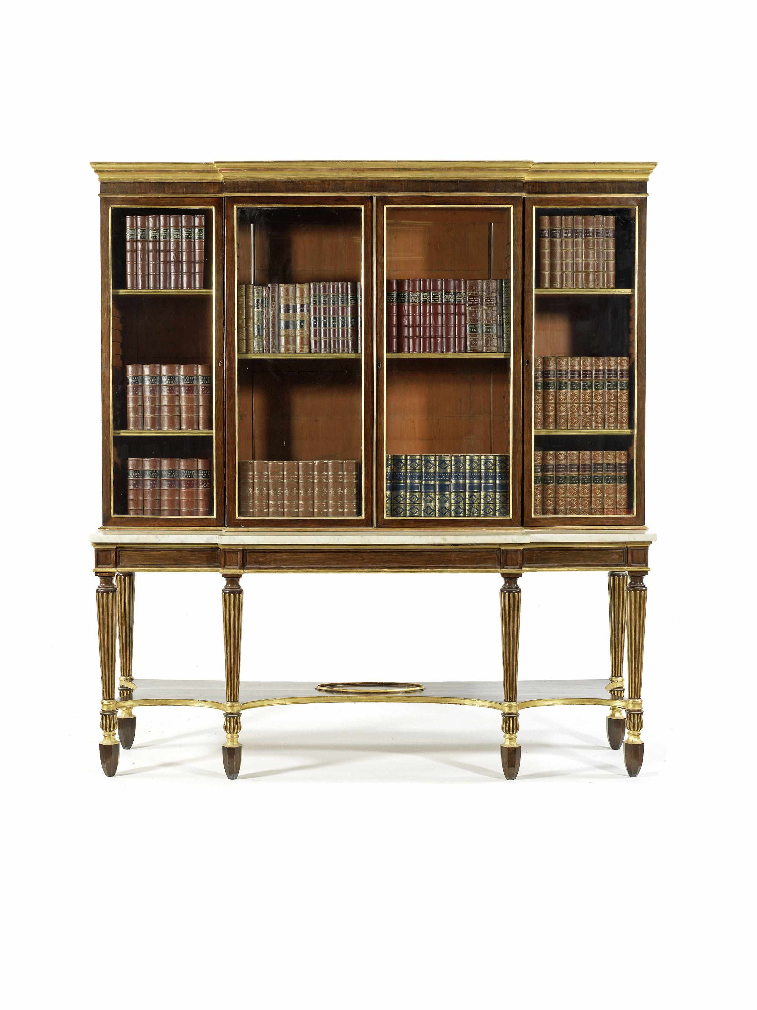 Appraisal: A Regency style rosewood simulated rosewood and parcel gilt breakfront