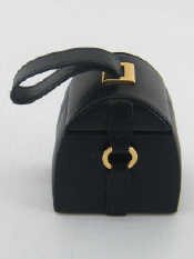 Appraisal: A small portable arch shaped jewellery case in black leather