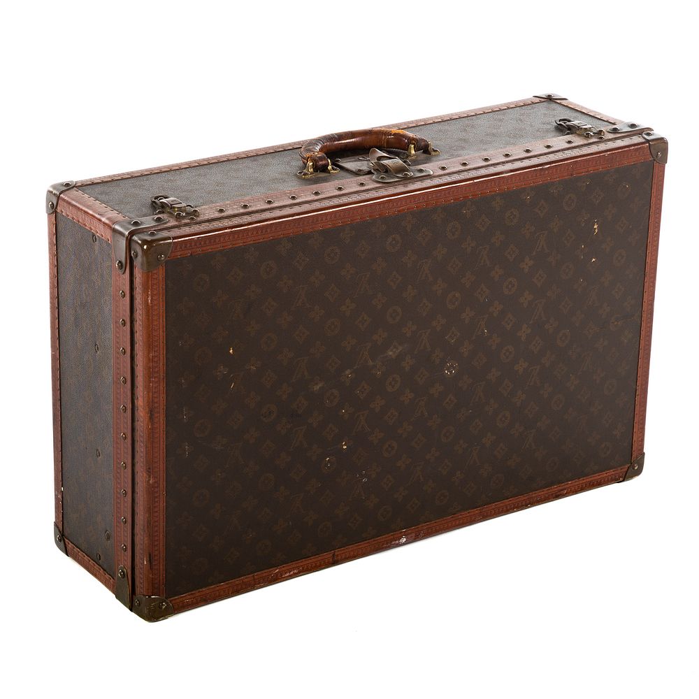 Appraisal: A Louis Vuitton Alzer Suitcase A brown and tan hand