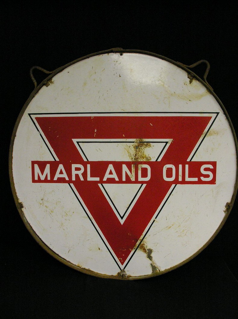 Appraisal: RARE CONOCO MARLAND OILS DOUBLE SIDED PORCELAIN SIGN original hanger