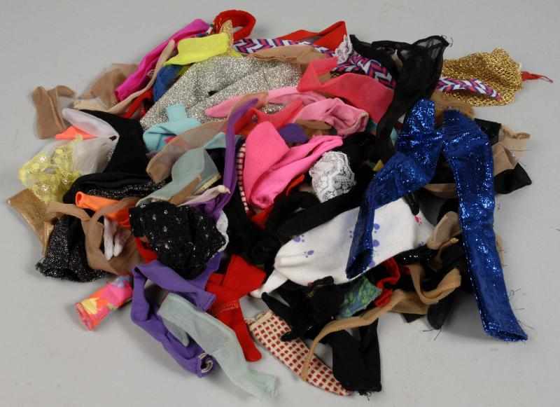 Appraisal: Huge Group of Barbie Shoes Hangers Description Group of vintage