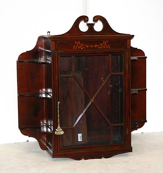 Appraisal: An Edwardian mahogany and marquetry hanging cabinet circa height in