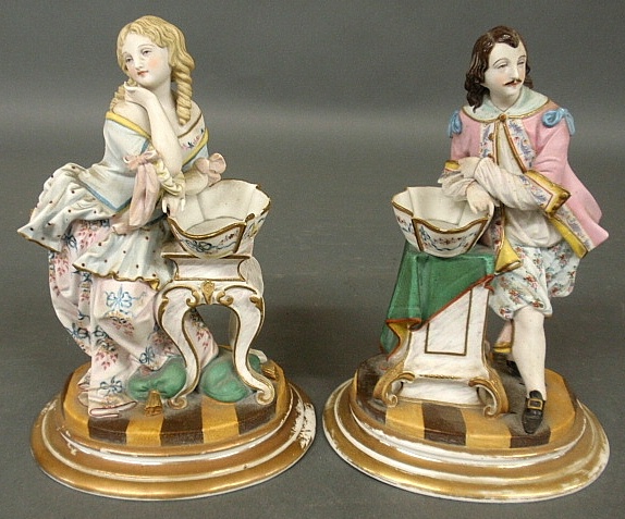 Appraisal: - Pair of French porcelain figures of a man and