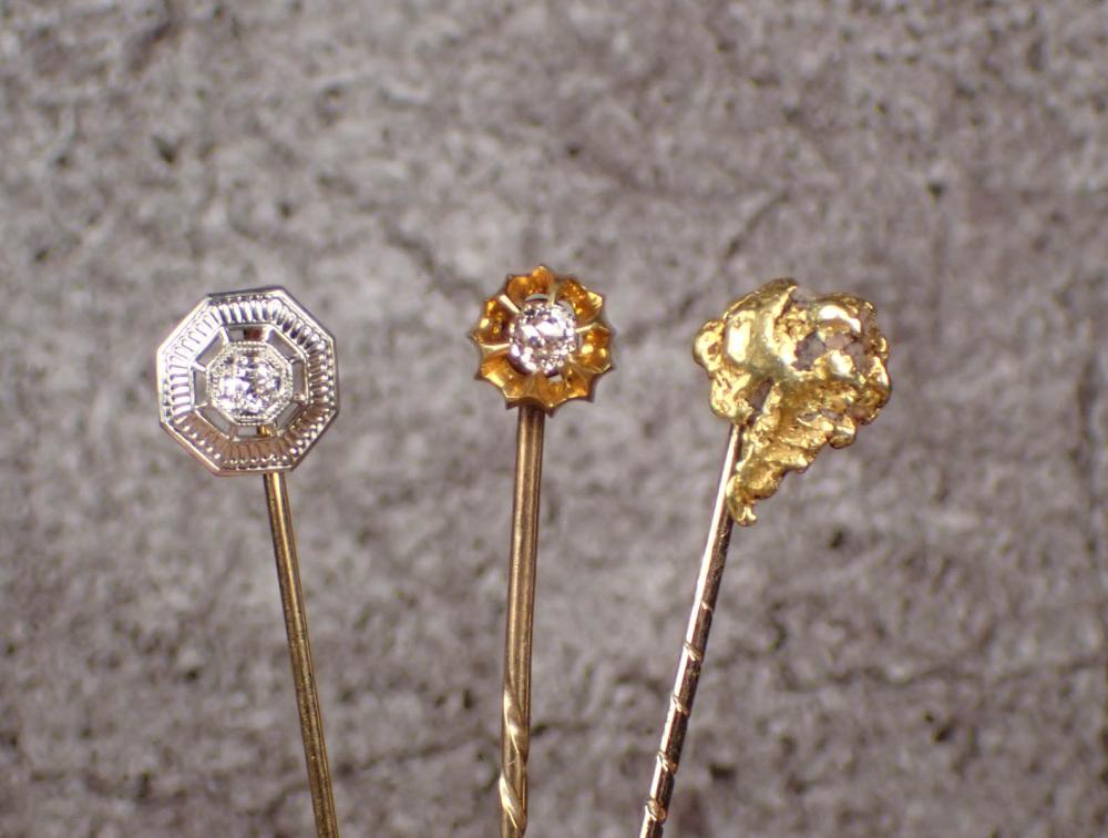 Appraisal: THREE VINTAGE STICK PINS all K gold two set with