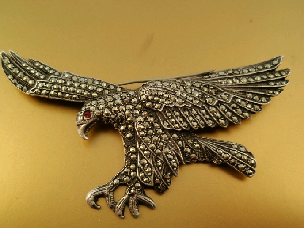 Appraisal: A white metal and marcasite brooch of an eagle cm