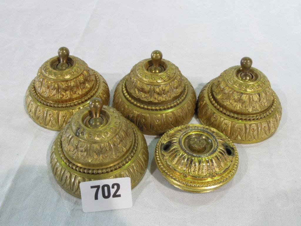 Appraisal: Four Edwardian elaborate gilt ormolu mounted light switches and a