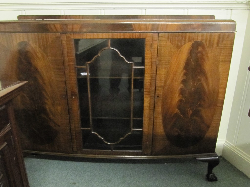 Appraisal: Mahogany bookcase on cabriole and ball and claw supports by