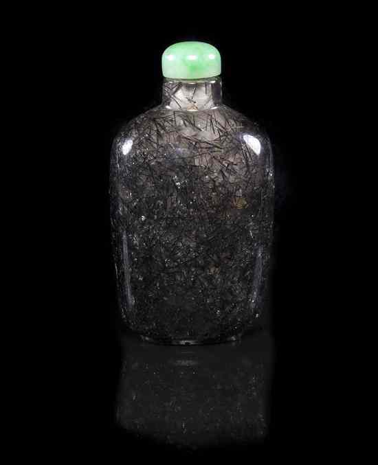 Appraisal: A Hair Quartz Snuff Bottle of rounded rectangular form having