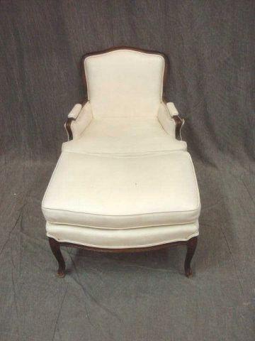 Appraisal: White Leather Louis XV Style Chair with Ottoman From a