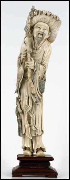 Appraisal: JAPANESE CARVED IVORY FIGURE OF A FISHERMAN Provenance The Collection