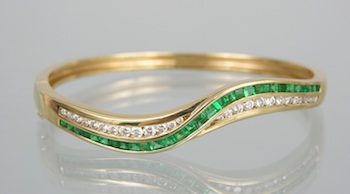 Appraisal: A Fine Diamond and Emerald Bangle Bracelet k yellow gold