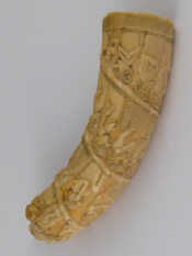 Appraisal: An early th century African carving on a warthog tusk