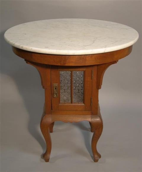 Appraisal: INDONESIAN MARBLE TOP TEA TABLE the circular white marble top