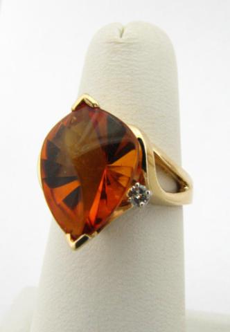 Appraisal: K Yellow Gold ring with approximately ct fancy cut amber