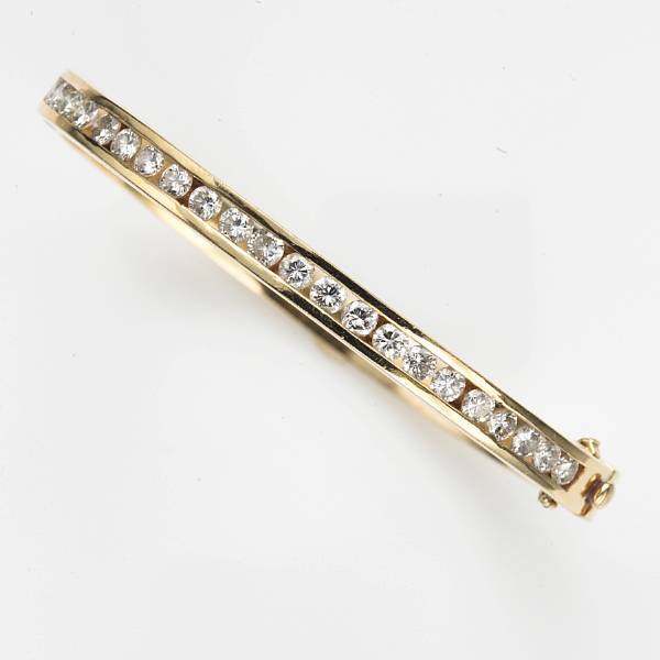 Appraisal: A diamond and fourteen karat gold bangle bracelet estimated total