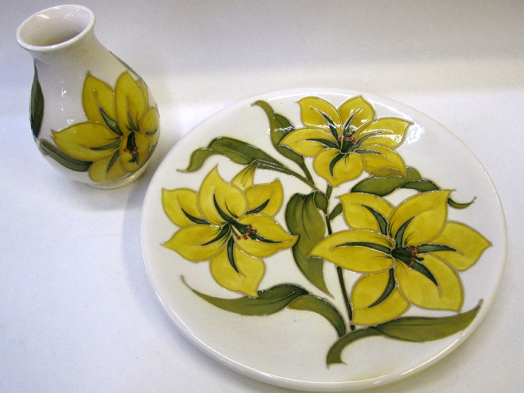 Appraisal: Moorcroft 'Bermuda Lily' vase and matching plate with yellow flowers