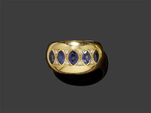 Appraisal: SAPPHIRE BRILLIANT-CUT DIAMOND AND GOLD RING Yellow gold Casual-elegant solid