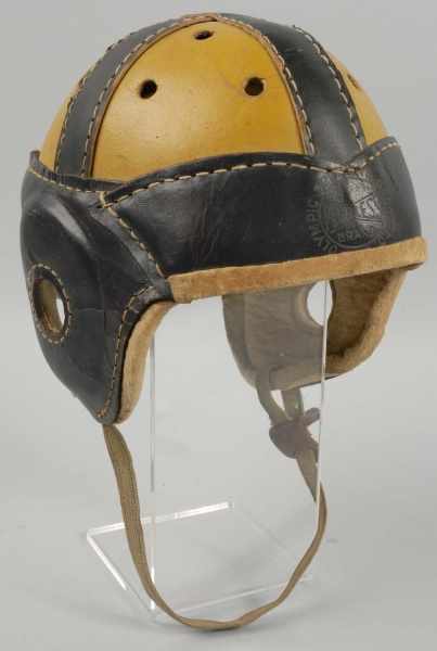 Appraisal: Early Leather Child's Football Helmet Description Marked Olympic Spalding Goods