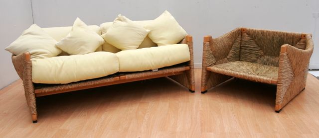 Appraisal: A Cassina pine and straw lounge suite including a two