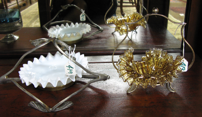 Appraisal: A GROUPING OF FOUR GLASS CANDY BOWLS AND PLATED STANDS