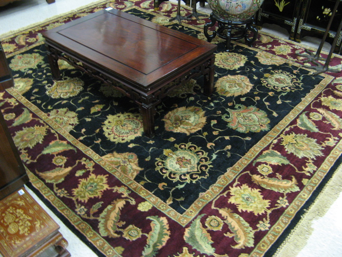 Appraisal: HAND KNOTTED ORIENTAL CARPET Indo-Persian overall floral arabesque design on