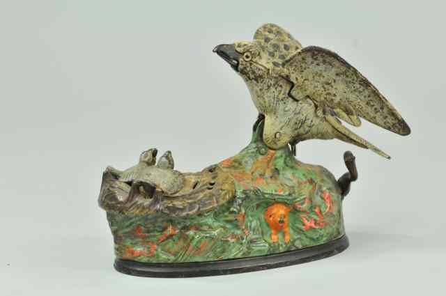 Appraisal: EAGLE AND EAGLETTS MECHANICAL BANK Green Base J E Stevens