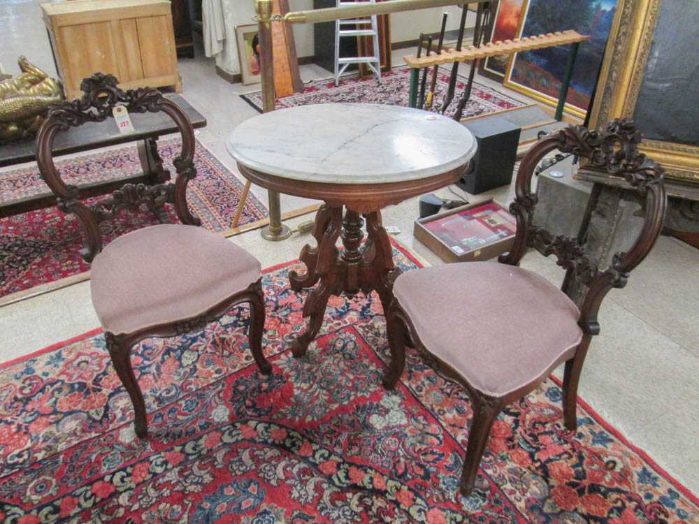 Appraisal: VICTORIAN LAMP TABLE AND CHAIRS American last quarter of the