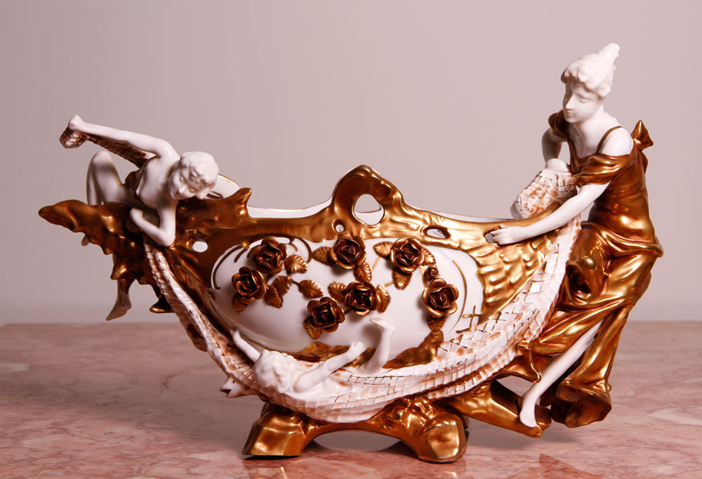 Appraisal: - Continental Porcelain Centerpiece Continental porcelain centerpiece with figural and