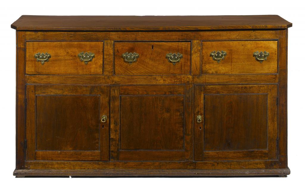 Appraisal: AN OAK AND FRUITWOOD DRESSER the largely single plank top