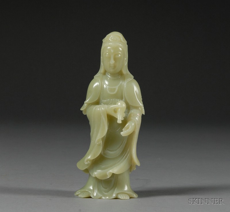 Appraisal: Jade Carving China uniform yellow-green color standing image of the