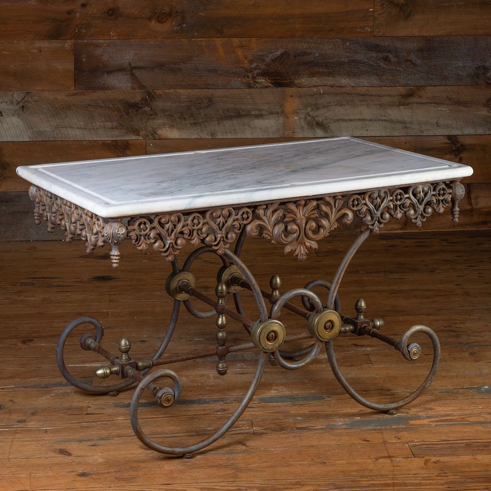 Appraisal: Brass-Mounted Wrought-Iron Center Table Fitted with a marble top x