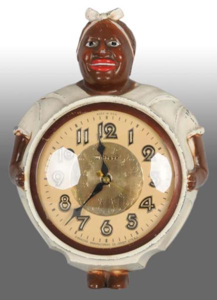 Appraisal: Mammy Black Americana Widsor Kitchen Clock Description Made by Gibraltar