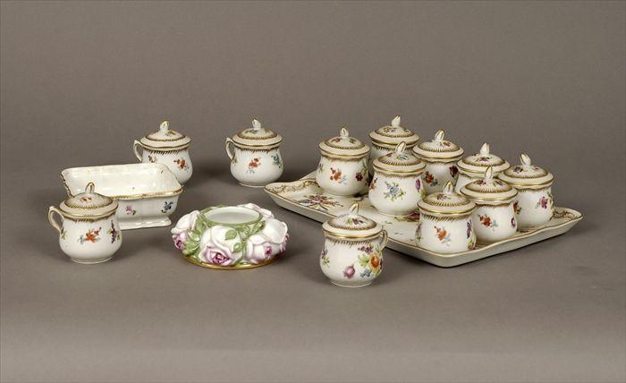 Appraisal: Set of Twelve German Gilt and Polychrome Decorated Porcelain Pots-de-Cr