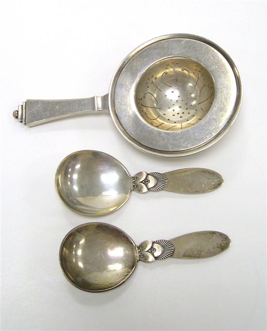 Appraisal: SILVER Georg Jensen Pyramid pattern tea strainer and two Cactus