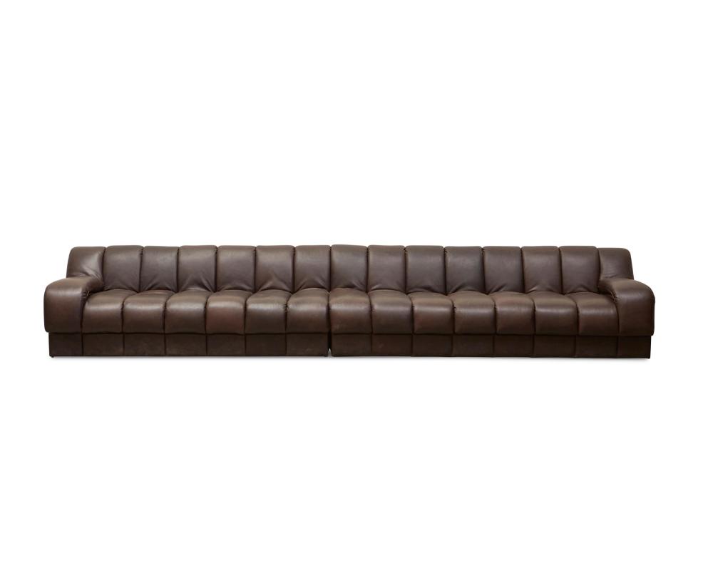 Appraisal: A custom De Sede-style leather sectional sofa st Century The