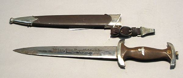 Appraisal: A German SA dagger The inch double edge blade marked