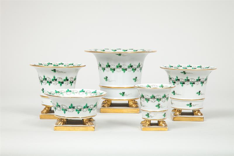 Appraisal: Five Herend Porcelain Urn-Form Cups On quadruple gilt lion's paw