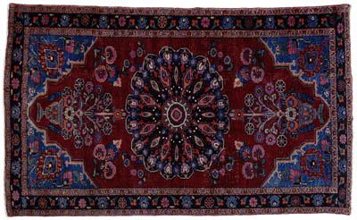 Appraisal: Hamadan rug central medallion on rich burgundy field blue accents